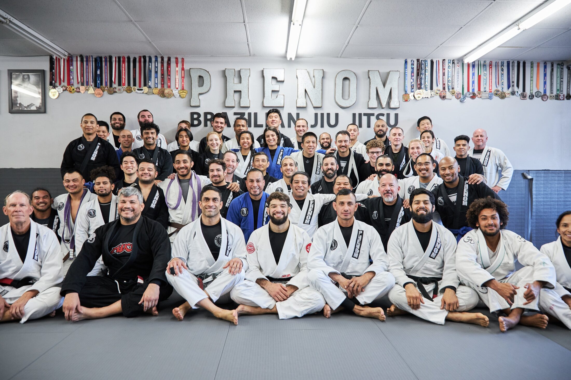 Adult Brazilian Jiu-Jitsu class training on the mats at Phenom BJJ in Irvine, California