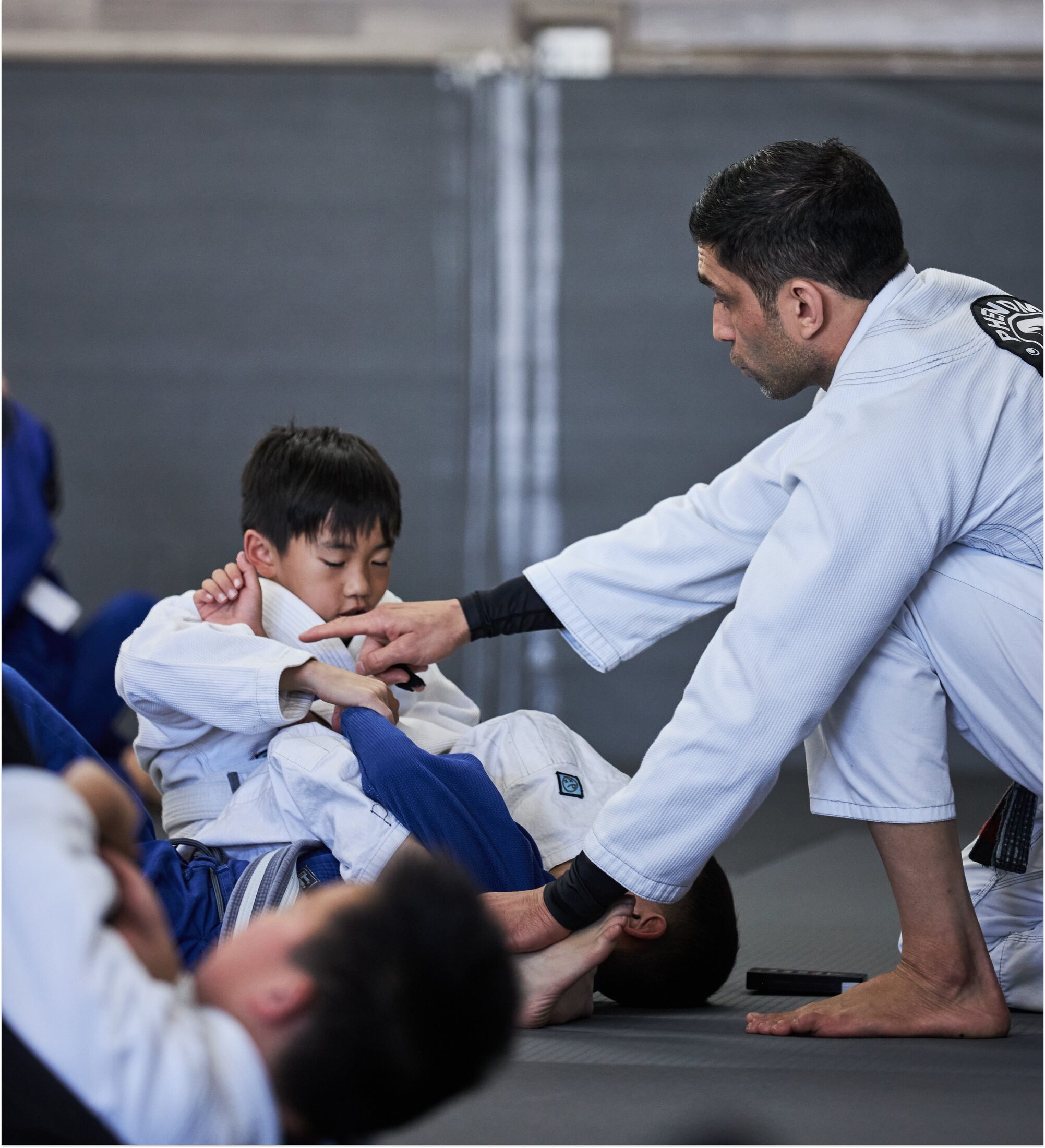 Professor Martin Morachimo teaching the kids Brazilian Jiu-Jitsu class at Phenom BJJ Irvine